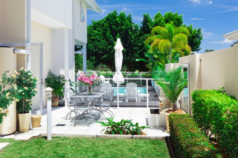 modern patio with a fenced pool