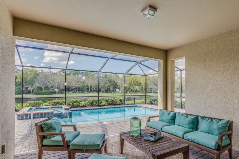 stylish patio and a roofed pool area