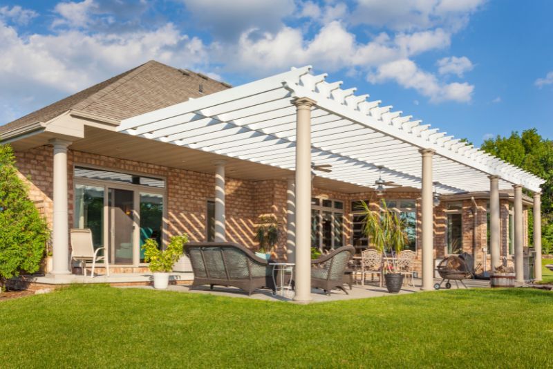Patio with pergola shade structure and outdoor seating