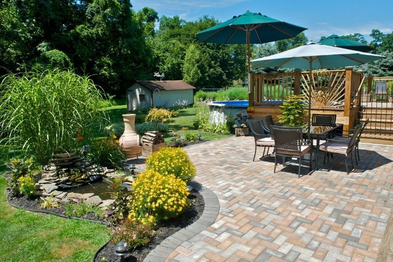 Paved patio set up as a cosy outdoor living space
